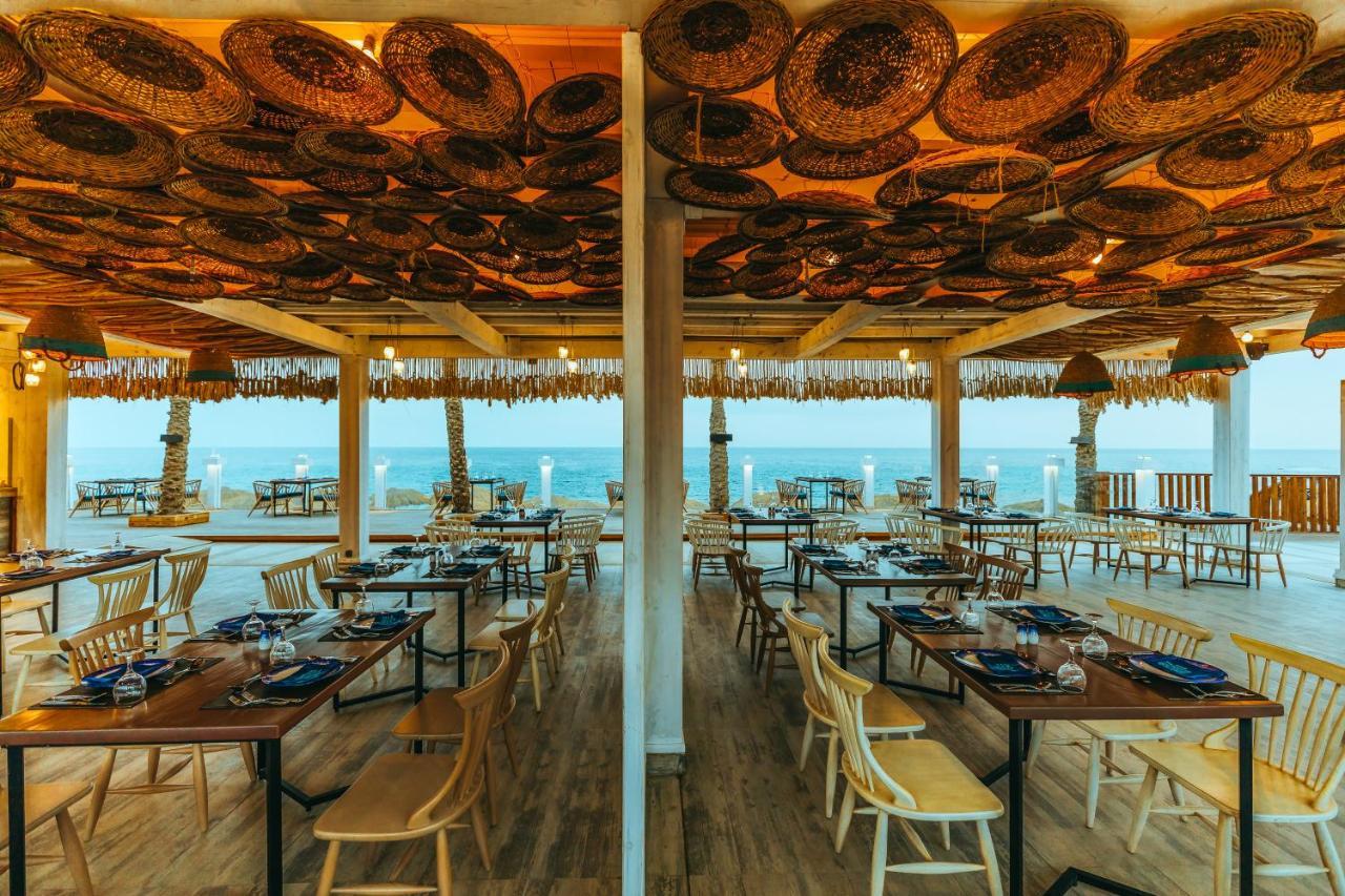 صن رايز دايموند بيتش ريزورت شرم الشيخ المظهر الخارجي الصورة The restaurant at the top of the lighthouse