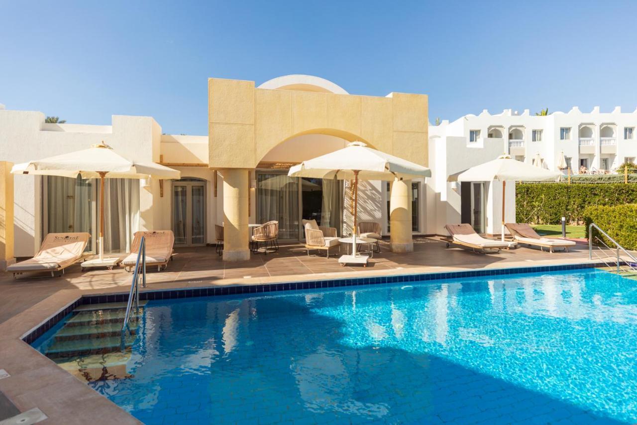 صن رايز دايموند بيتش ريزورت شرم الشيخ المظهر الخارجي الصورة The swimming pool at the hotel